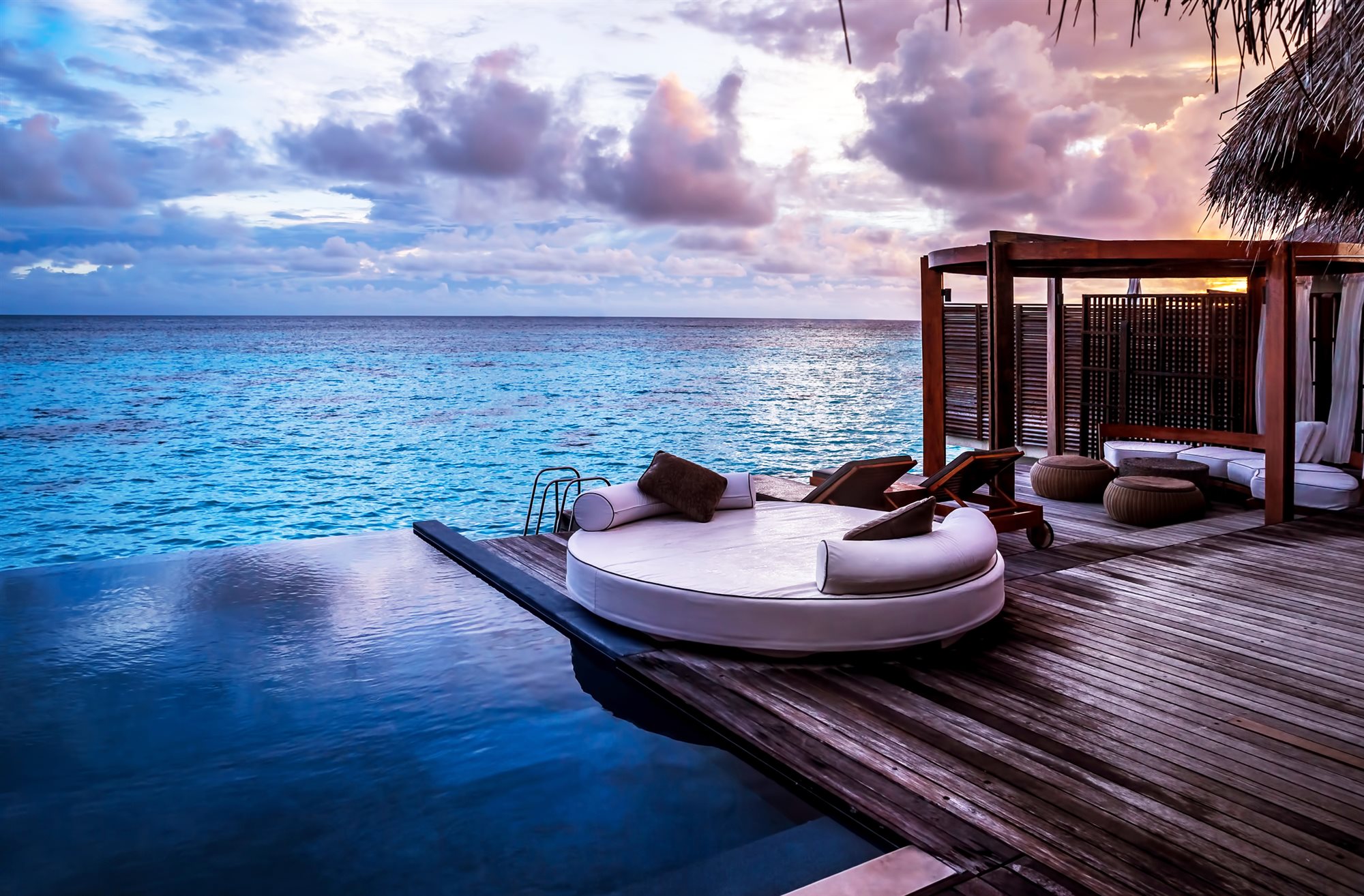 A luxury beach resort with a pool